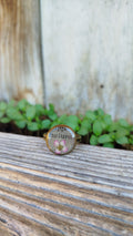 Anello regolabile con fiore di alisso