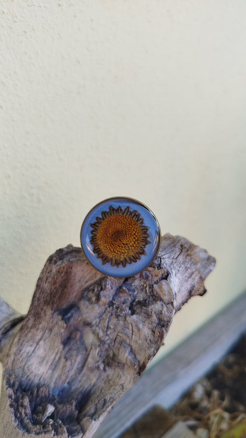 Anello regolabile con capolino di margherita