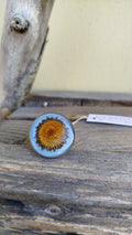 Anello regolabile con capolino di margherita