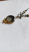 Collana con astranzia maggiore e pietre di agata muschiata dendritica